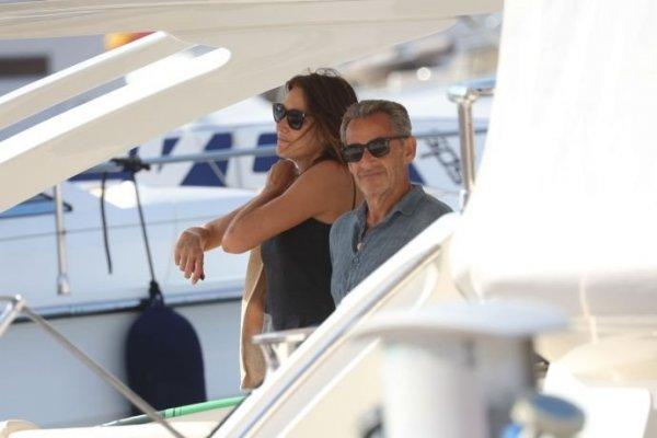 Nicolas Sarkozy and his wife Carla enjoy their vacation