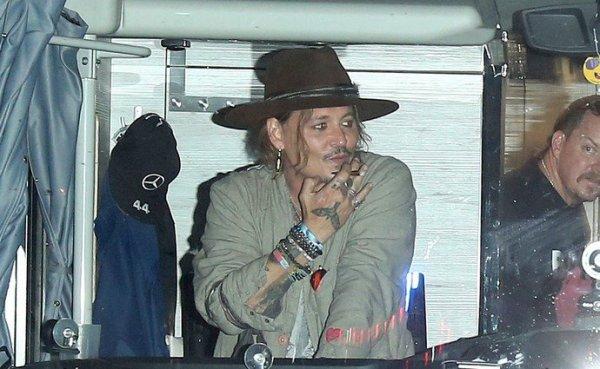 Johnny Depp hovered over the stage as Moonman