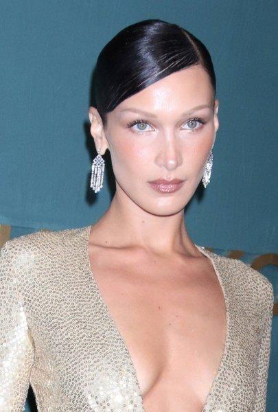 Bella Hadid in a golden dress for half a million received the Golden Heart Award
