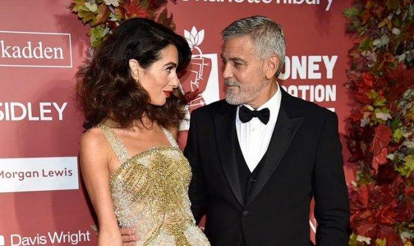 Glamorous George and Amal Clooney have declared themselves 'Defenders of Justice'