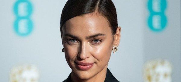 Irina Shayk in a cheeky outfit and Bradley Cooper in a bear costume walked arm in arm on Halloween