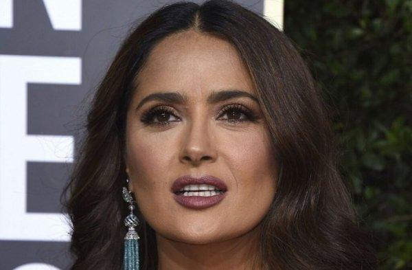 Salma Hayek with an indecent cleavage and Eddie Redmayne in a flower on his chest delighted fans on the red carpet