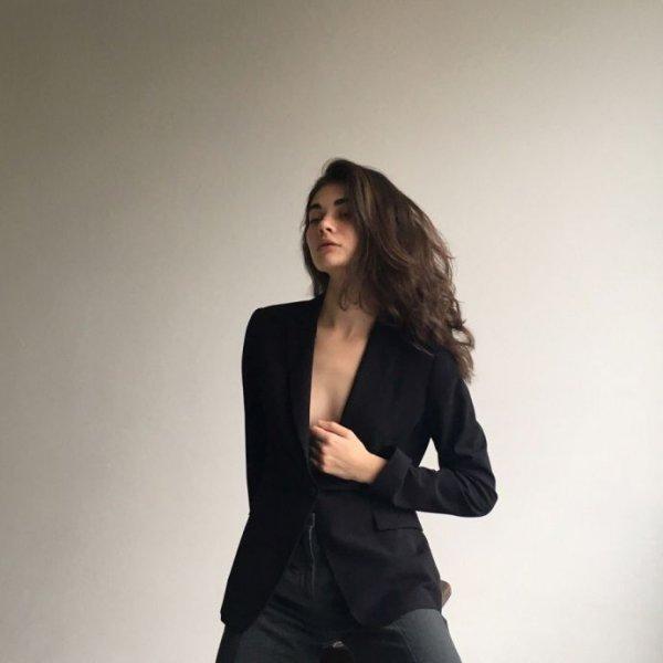 Kendall Jenner threw a jacket over her bare chest