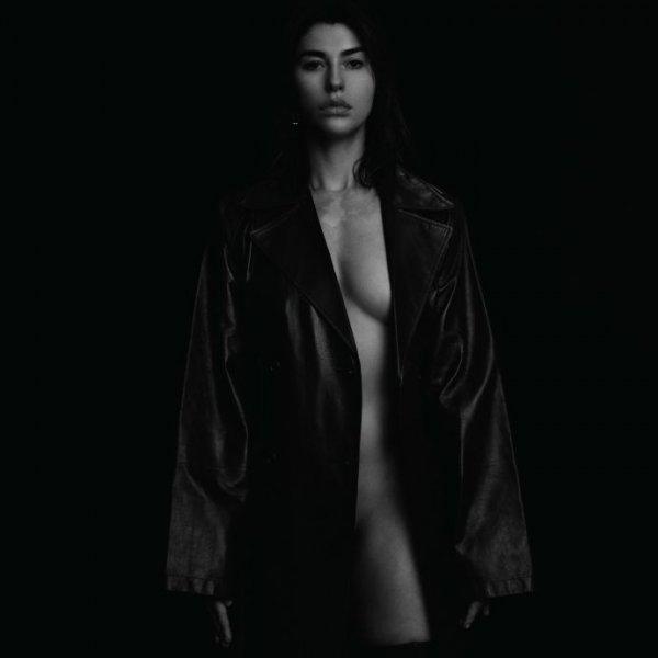 Kendall Jenner threw a jacket over her bare chest