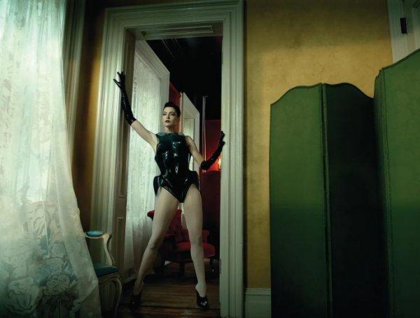 Anne Hathaway in lingerie and latex dresses posing for Vanity Fair