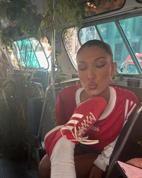 At an Adidas event, Bella Hadid almost kissed the sole someone else's sneakers