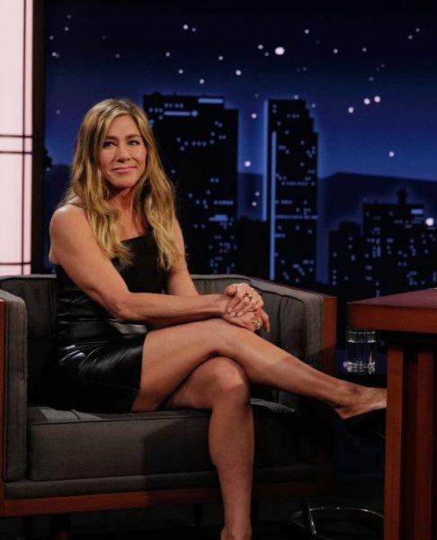 Jennifer Aniston wore a daring mini, showing off her perfect legs