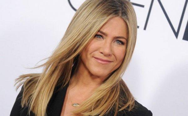 Jennifer Aniston Wears a Bold Mini, Showing Off Her Perfect Legs